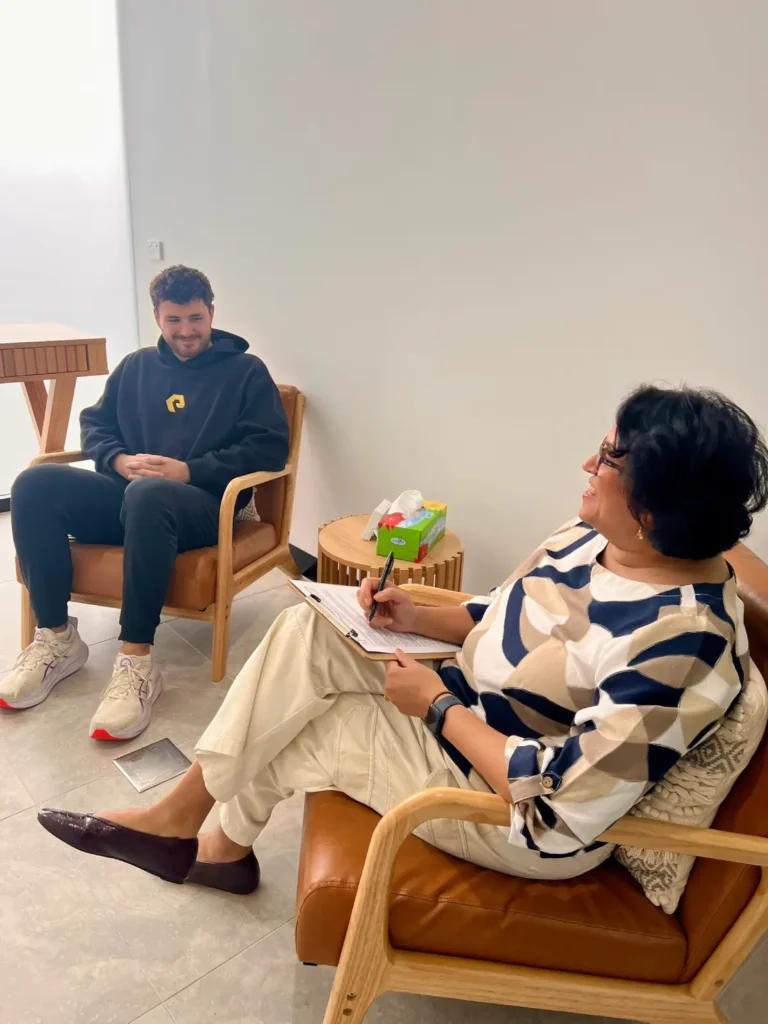 therapist and patient discussing anxiety issues